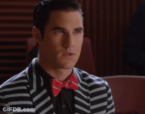 Man In Striped Jacket And Bow Tie GIF