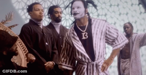 Man In Striped Robe With Letter B GIF