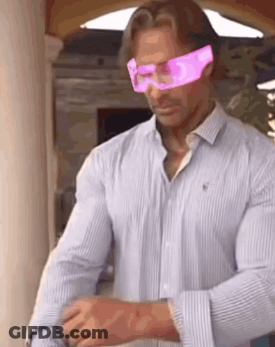 Man In Striped Shirt And Pink Glasses GIF