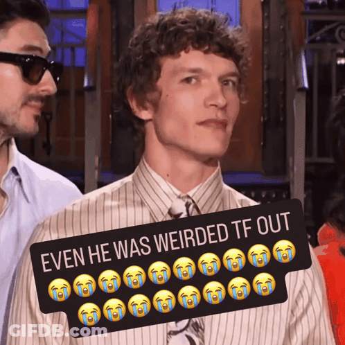 Man In Striped Shirt And Tie Next To Weird Sign GIF