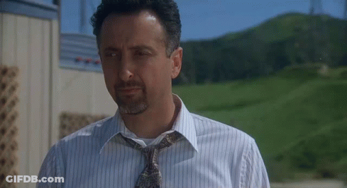 Man In Striped Shirt And Tie Outside GIF