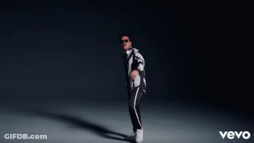 Man In Striped Shirt And Tie With Diamonds GIF
