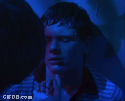 Man In Striped Shirt Covering Face GIF