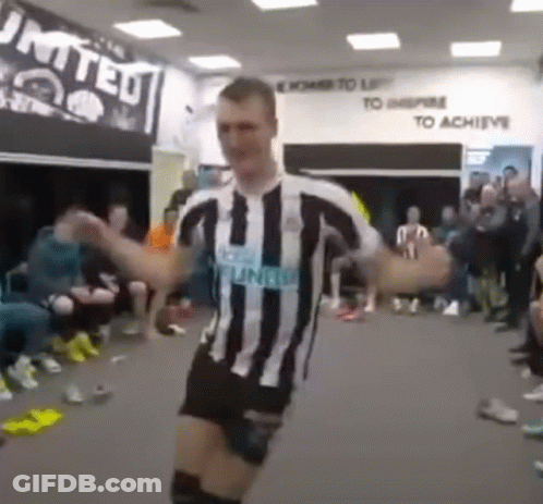 Man In Striped Shirt Dancing GIF