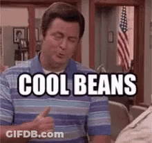 Man In Striped Shirt Giving Thumbs Up GIF