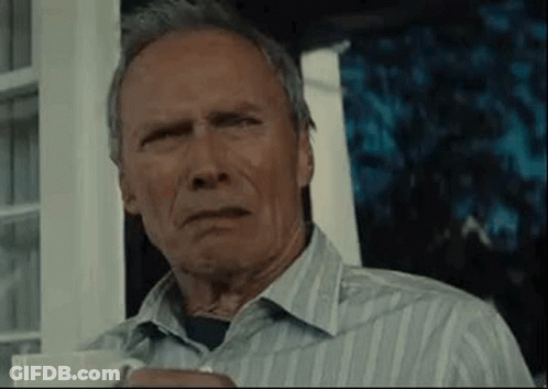 Man In Striped Shirt Holding Coffee GIF