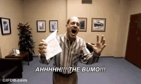 Man In Striped Shirt Holding Paper And Screaming GIF