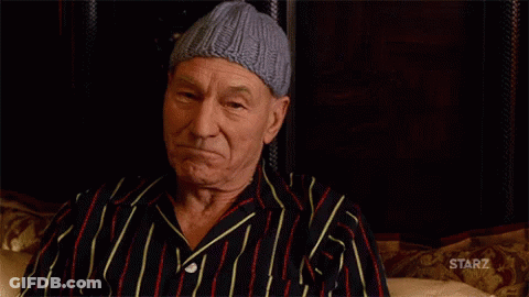 Man In Striped Shirt Holding Whiskey At Starz Sign GIF