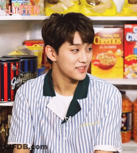 Man In Striped Shirt In Front Of Cheerios Shelf GIF