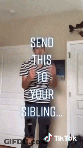 Man In Striped Shirt In Front Of Send This To Your Sibling Door GIF