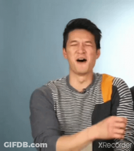 Man In Striped Shirt Laughing Eyes Closed GIF