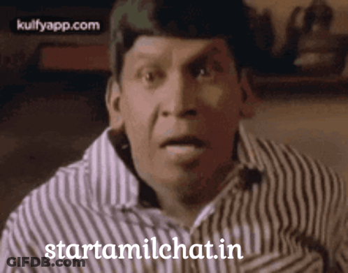 Man In Striped Shirt Making Funny Face GIF