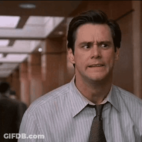 Man In Striped Shirt Making Funny Face GIF