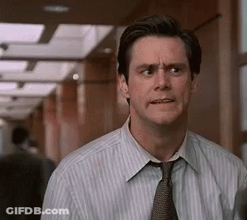 Man In Striped Shirt Making Funny Face GIF