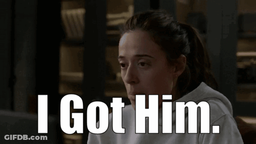 Man In Striped Shirt Making Funny Face GIF