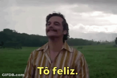 Man In Striped Shirt Saying Feliz GIF