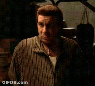 Man In Striped Shirt Saying Indeed We Do GIF