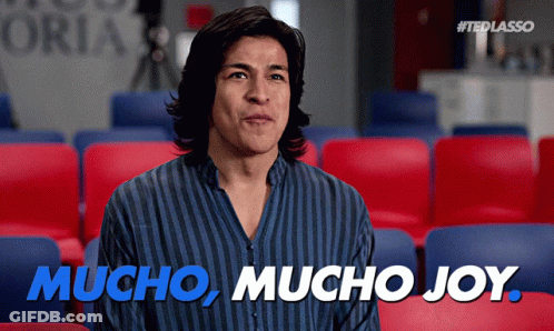 Man In Striped Shirt Saying Mucho Mucho Joy GIF