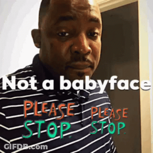 Man In Striped Shirt Saying Not A Baby Face GIF