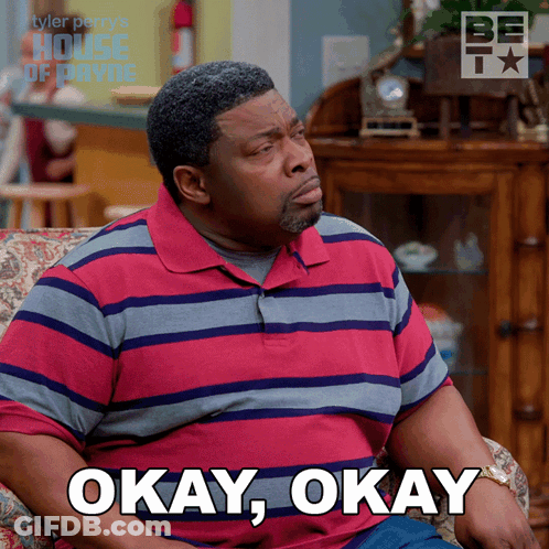 Man In Striped Shirt Saying Okay GIF