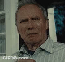 Man In Striped Shirt Sitting By Window GIF