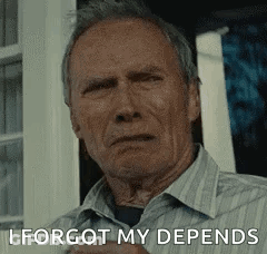 Man In Striped Shirt Sitting By Window GIF