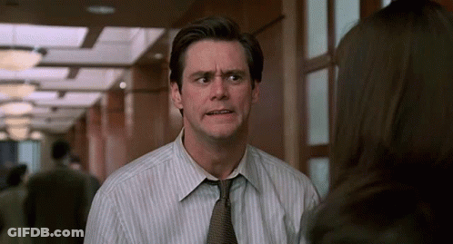 Man In Striped Shirt Talking To Woman GIF