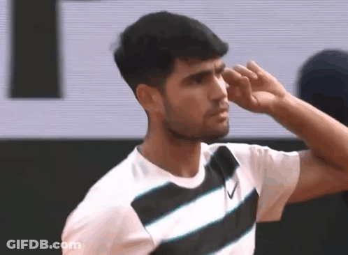 Man In Striped Shirt Wiping Nose GIF
