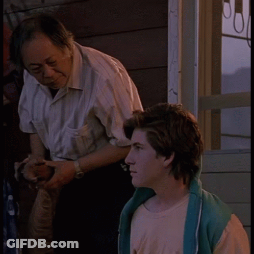Man In Striped Shirt With Boy In Pink Shirt GIF
