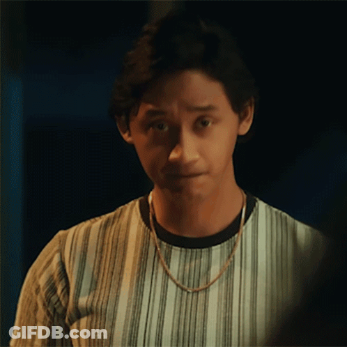 Man In Striped Shirt With Gold Chain GIF