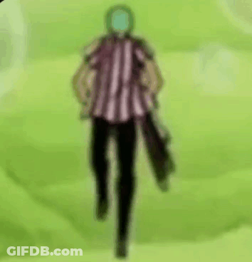 Man In Striped Shirt With Green Face Standing In Field GIF