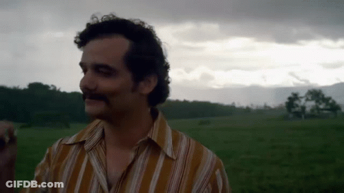 Man In Striped Shirt With Mustache GIF