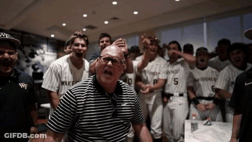 Man In Striped Shirt With Number 5 GIF