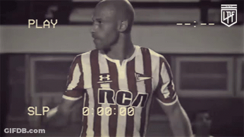 Man In Striped Shirt With RCA GIF