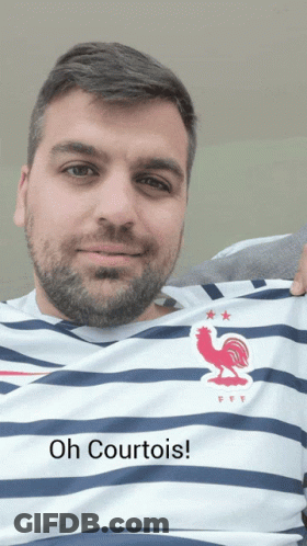 Man In Striped Shirt With Rooster Oh Courtois GIF