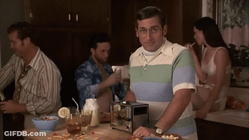 Man In Striped Shirt With Toaster And Cereal GIF