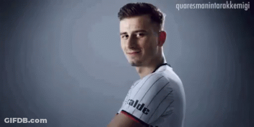 Man In Striped Shirt With Valde Smiling GIF