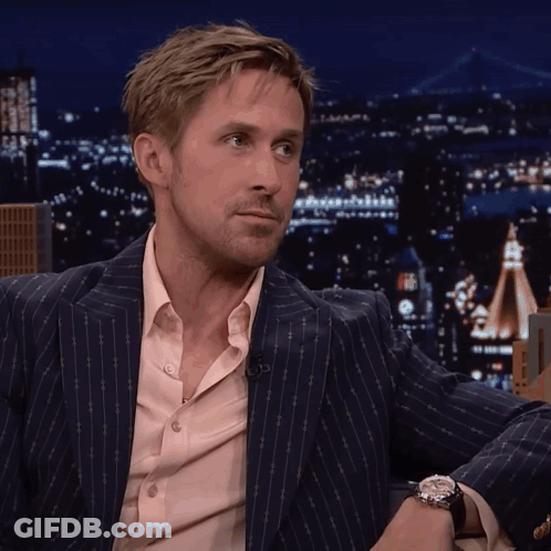 Man In Striped Suit City Night GIF