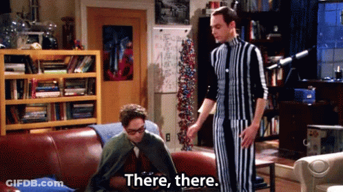 Man In Striped Suit Says There There Beside Man On Couch GIF