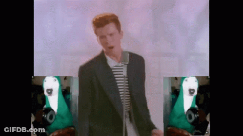 Man In Striped Suit Singing Amidst Animal Pictures GIF