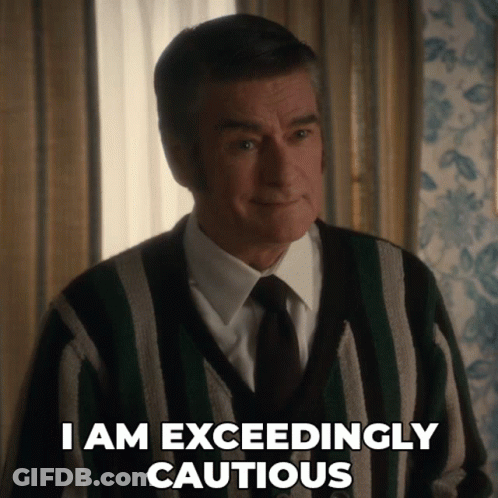 Man In Striped Sweater And Tie Saying I Am Exceedingly Cautious GIF