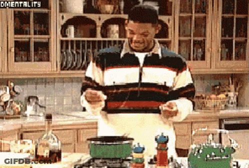 Man In Striped Sweater Cooking In Kitchen Mentality GIF