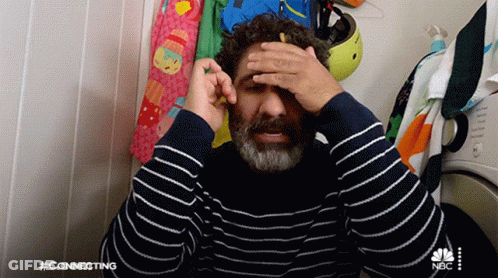 Man In Striped Sweater Saying Connecting GIF
