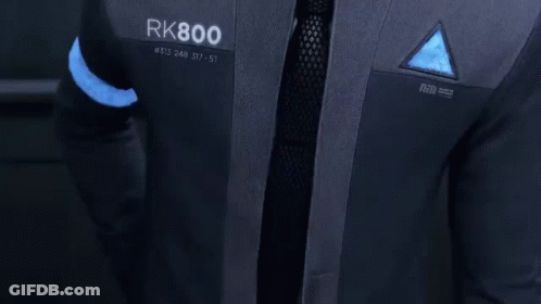 Man In Suit Adjusting Collar GIF