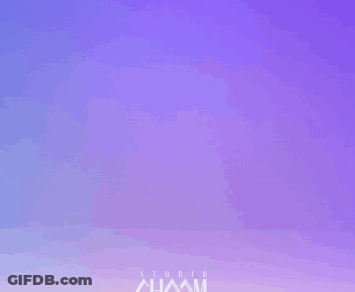 Man In Suit Adjusting Ear Plugs GIF