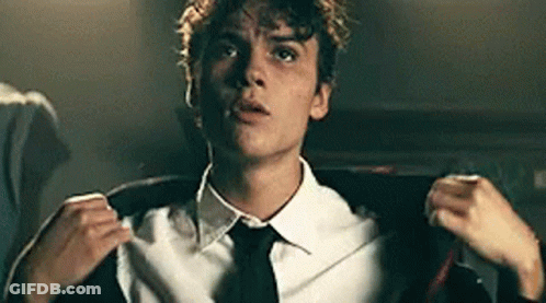 Man In Suit Adjusting Jacket GIF