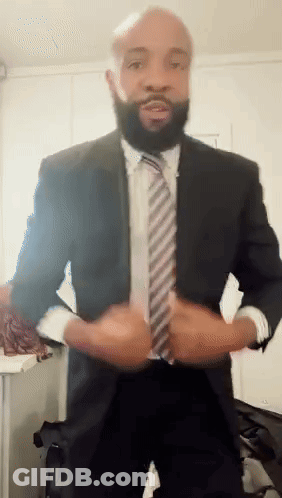 Man In Suit Adjusting Jacket GIF