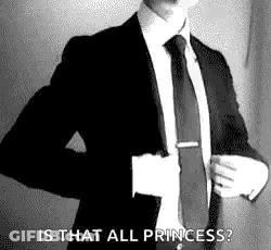 Man In Suit Adjusting Tie GIF
