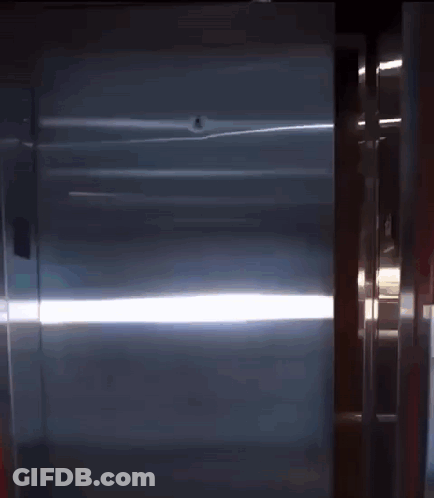 Man In Suit Adjusting Tie GIF