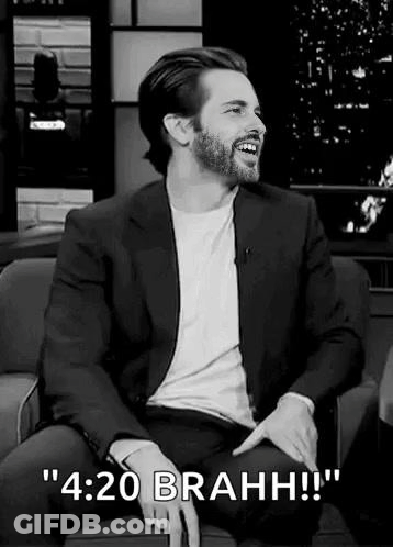 Man In Suit And Beard Laughing Black And White GIF